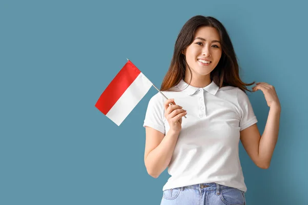 Young Asian Woman Flag Indonesia Blue Background — ストック写真