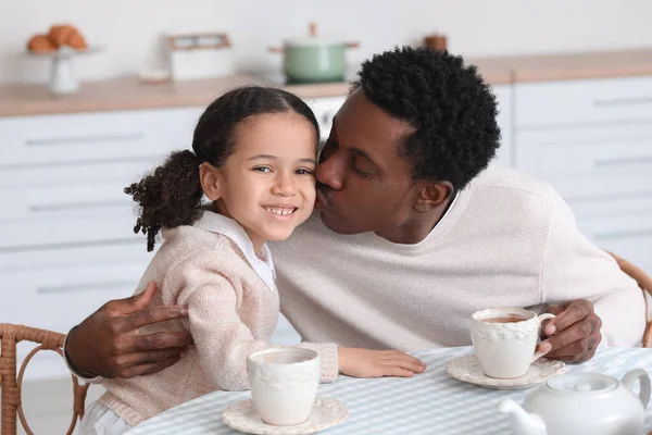 Happy African American Man Kissing His Little Daughter Kitchen — Stock Photo, Image
