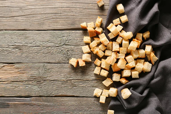 Many Crunchy Croutons Wooden Table — Stock Photo, Image