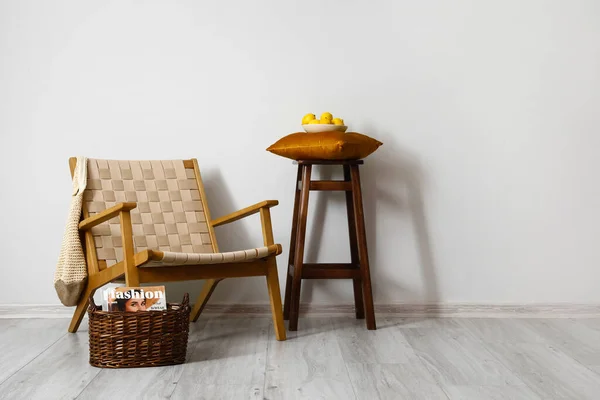 Comfortable Armchair Stool Wicker Basket Light Wall Room Interior — Stock Photo, Image