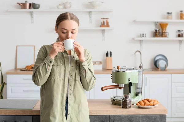 Young Woman Drinking Tasty Coffee Kitchen — Stock Photo, Image