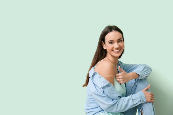 Young Woman Applied Medical Patch Showing Thumb Color Background — Stock Photo, Image