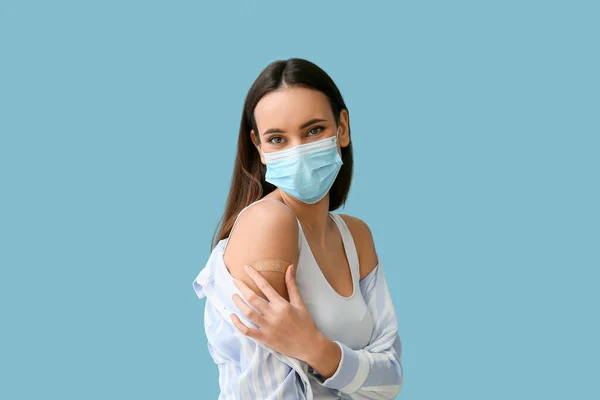Young Woman Mask Applied Medical Patch Blue Background — Stock Photo, Image