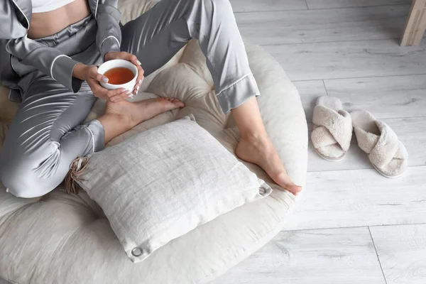 Barefoot Woman Cup Tea Sitting Pouf Home — Stock Photo, Image