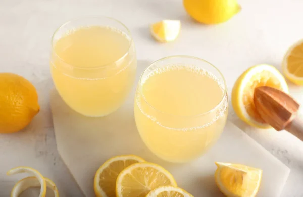 Board Glasses Fresh Lemon Juice Light Background Closeup — Stock Photo, Image