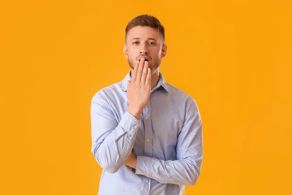 Young Man Ear Plugs Yawning Yellow Background — Stock Photo, Image