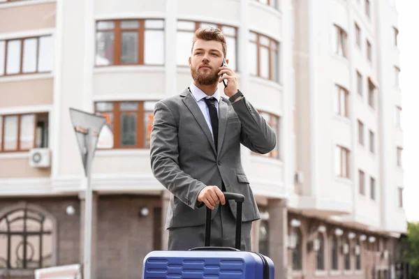 Handsome Businessman Blue Suitcase Talking Mobile Phone Outdoors — Stock Photo, Image