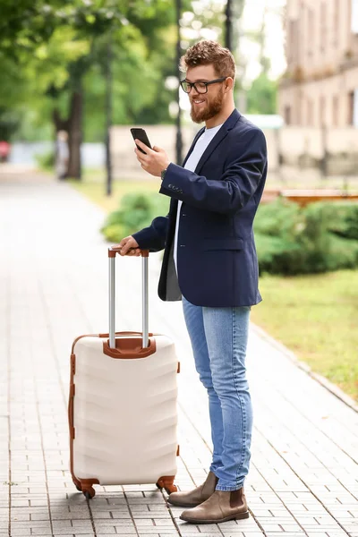 Handsome Young Man Suitcase Using Mobile Phone Outdoors — Stock Photo, Image