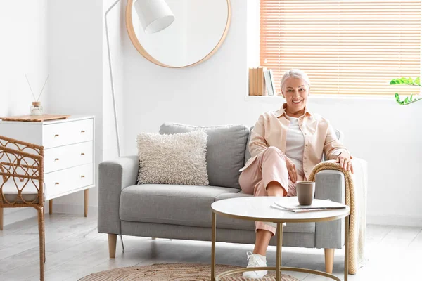 Mature Woman Sitting Soft Sofa Home — Stock Photo, Image