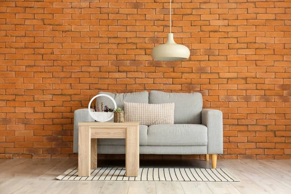 Stylish Sofa Table Brick Wall — ストック写真
