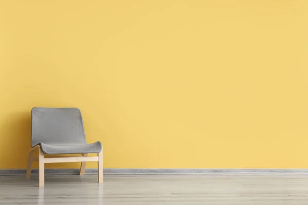 Comfortable Armchair Yellow Wall — Stock Photo, Image
