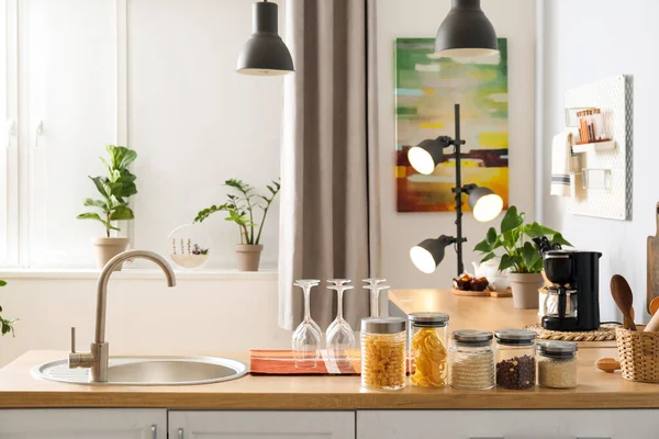 Wooden Counter Silver Sink Glasses Jars Light Kitchen — Stock Photo, Image