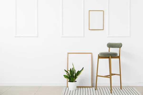 New Chair Blank Posters Houseplant White Wall — Stock Photo, Image