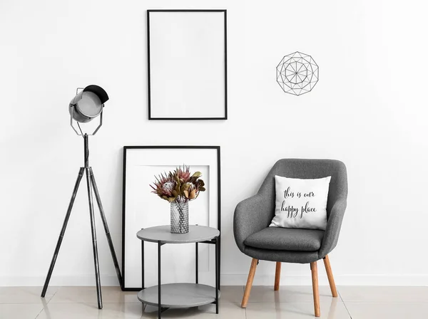 Stylish Interior Modern Armchair Blank Picture Frames Table Lamp — Stock Photo, Image