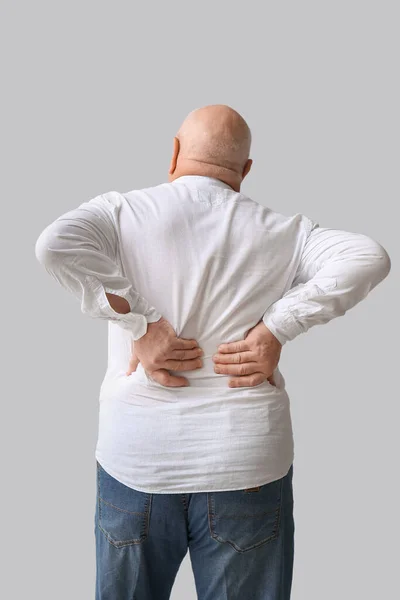 Senior Man Back Pain Light Background — Stock Photo, Image