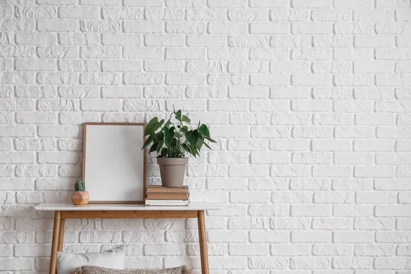 Beautiful Houseplant Blank Frame Table White Brick Wall — Stock Photo, Image