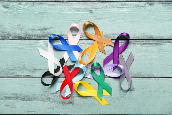 Different Colorful Awareness Ribbons Color Wooden Background World Cancer Day — Stock Photo, Image