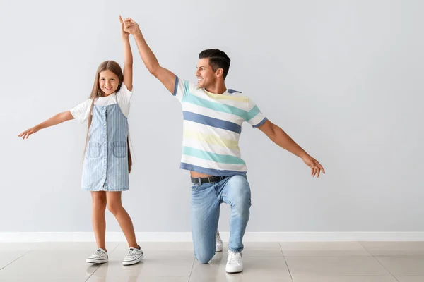 Happy Dancing Man His Daughter Light Background — Stock Photo, Image