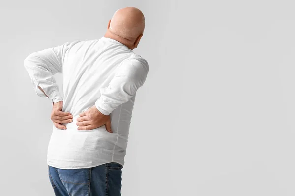Senior Man Back Pain Light Background — Foto Stock