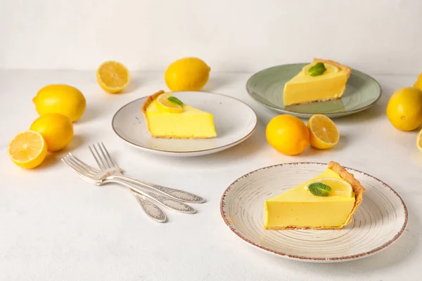 Plates Pieces Tasty Lemon Pie Fresh Fruits White Background — Stock Photo, Image