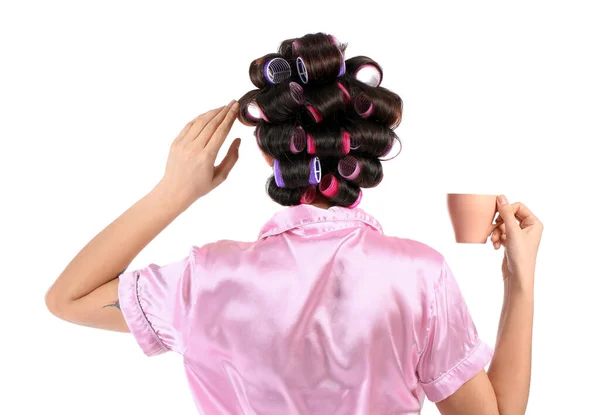 Mooie Jonge Vrouw Pyjama Haar Krulspelden Drinken Koffie Witte Achtergrond — Stockfoto