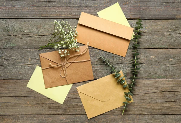 Envelopes Cards Flowers Eucalyptus Branches Wooden Background — Stock Photo, Image