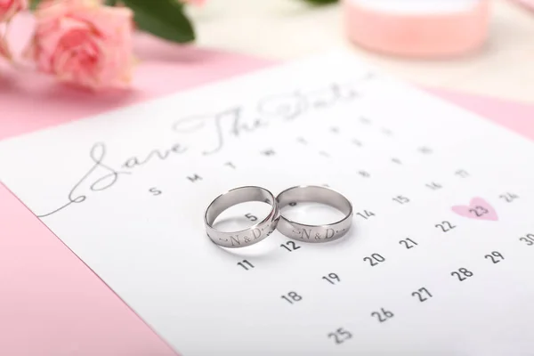 Wedding Rings Engraved Initials Calendar Table Closeup — Stock Photo, Image