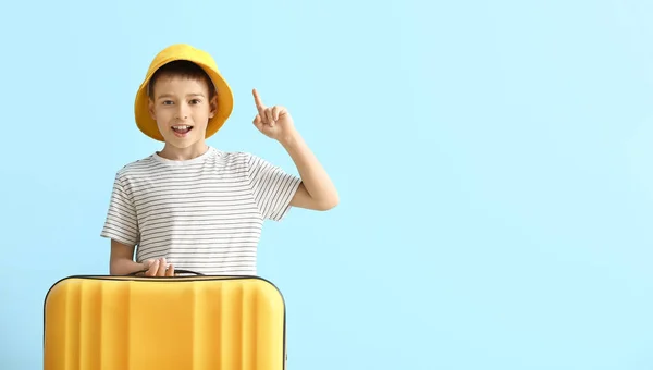 Adorable Little Boy Raised Index Finger Suitcase Blue Background — Stock Photo, Image