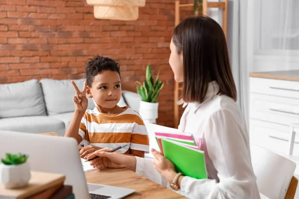 Little African American Boy Showing Two Fingers While Studying Mathematics — Stock Photo, Image