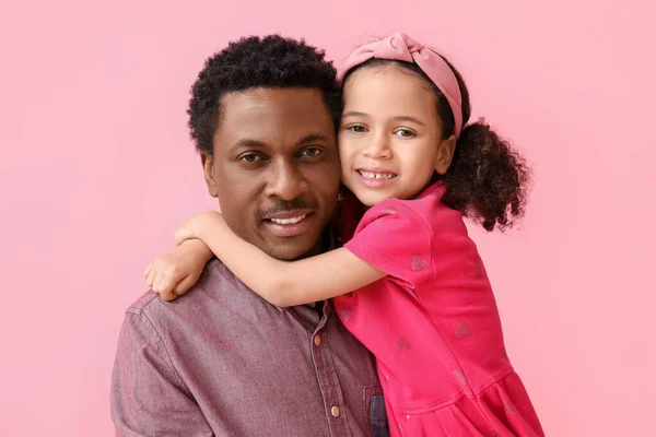 Portrait Little African American Girl Hugging Her Father Pink Background — Stock Photo, Image