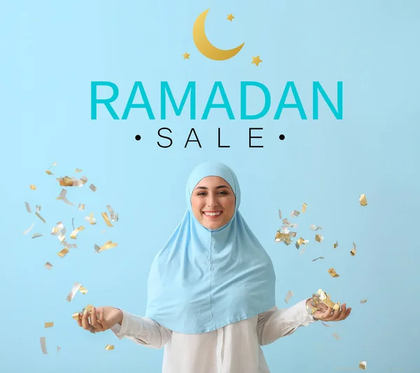 Young Muslim Woman Confetti Text Ramadan Sale Light Blue Background — Stock Photo, Image