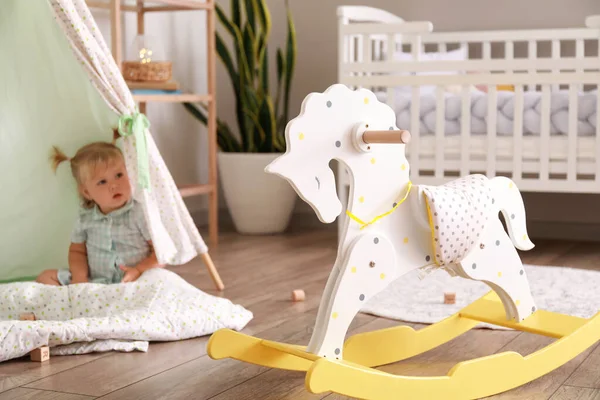 Classic Rocking Horse Adorable Baby Girl Playroom — Stock Photo, Image