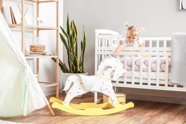 Adorable Baby Girl Bed Rocking Horse Room — Stock Photo, Image