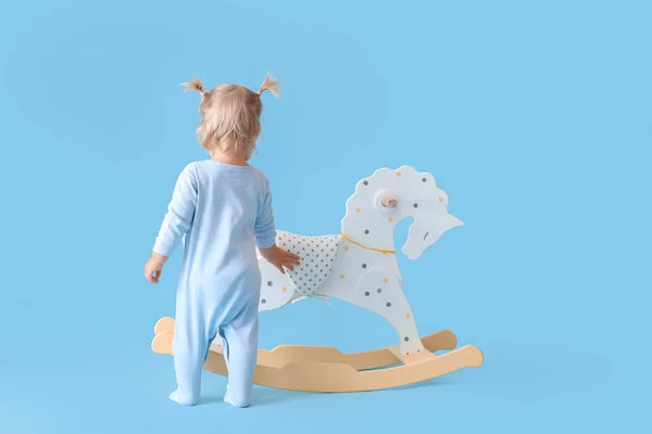 Adorable Baby Girl Rocking Horse Blue Background — Stock Photo, Image