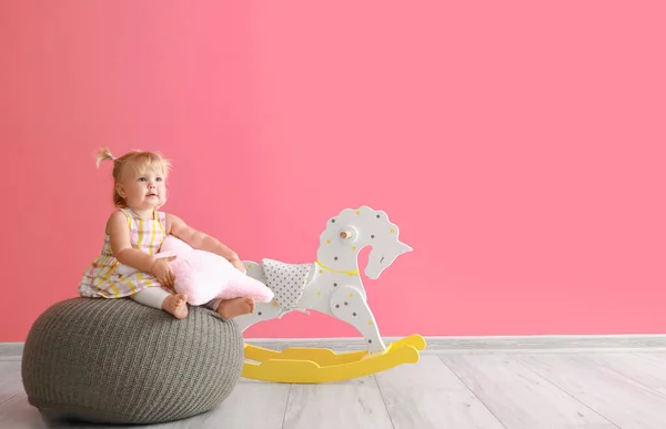 Adorable Baby Girl Pillow Sitting Pouf Rocking Horse — Stock Photo, Image