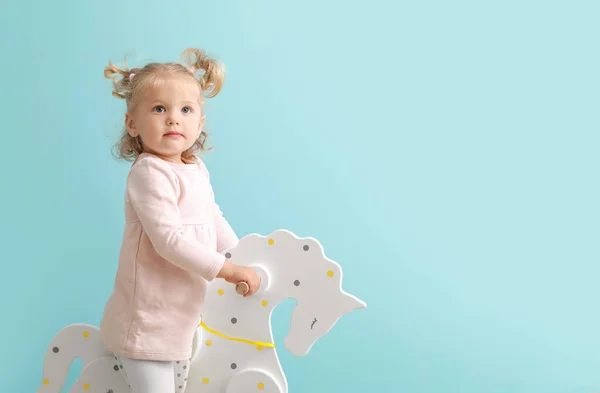 Adorable Baby Girl Rocking Horse Blue Background — Stock Photo, Image