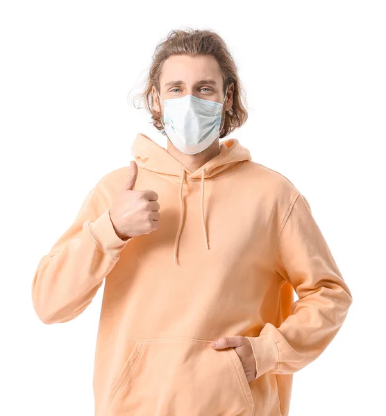Young Man Medical Mask Showing Thumb White Background — Stock Photo, Image
