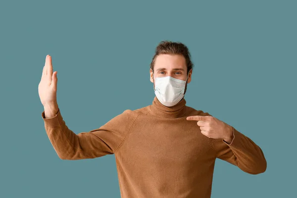 Young Man Medical Mask Showing Stop Gesture Color Background — Stock Photo, Image
