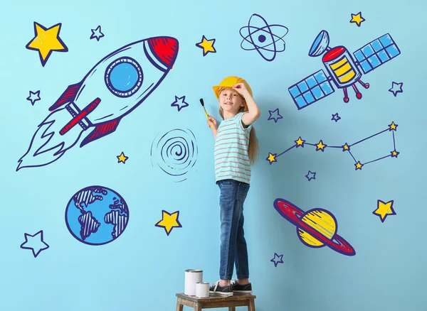 Cute Little Girl Painting Space Blue Wall — Stock Photo, Image