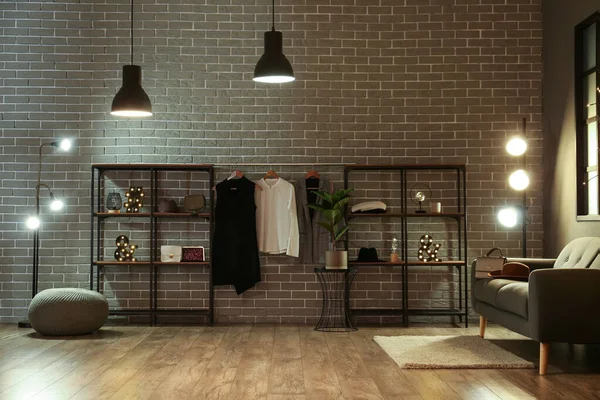 Shelving Units Accessories Clothes Glowing Lamps Brick Wall — ストック写真