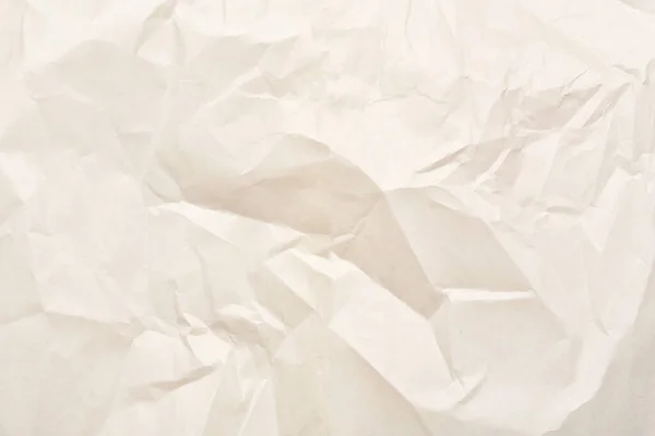 Texture of white crumpled paper, closeup