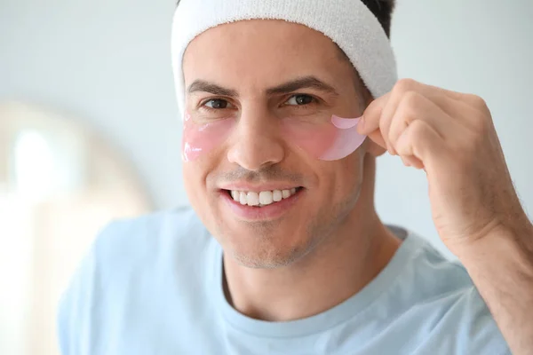 Handsome Man Applying Eye Patch Bathroom Closeup — Stock Photo, Image