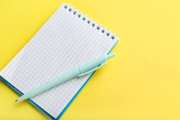 Notebook Pen Yellow Background — Stock Photo, Image