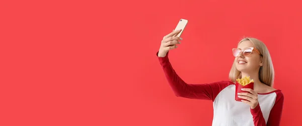 Beautiful Young Woman French Fries Taking Selfie Red Background — Stock Photo, Image