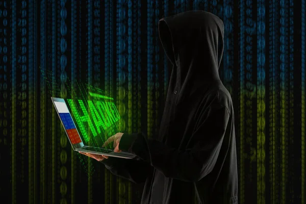 Ukrainian Hacker Holding Laptop Russian Flag Screen Dark Background — Stock Photo, Image