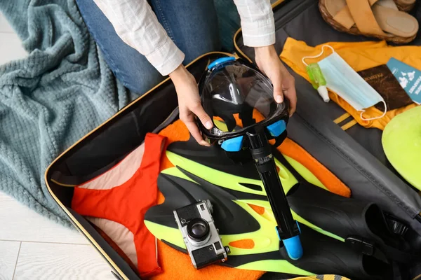 Woman Packing Snorkeling Mask Suitcase Home — Stock Photo, Image