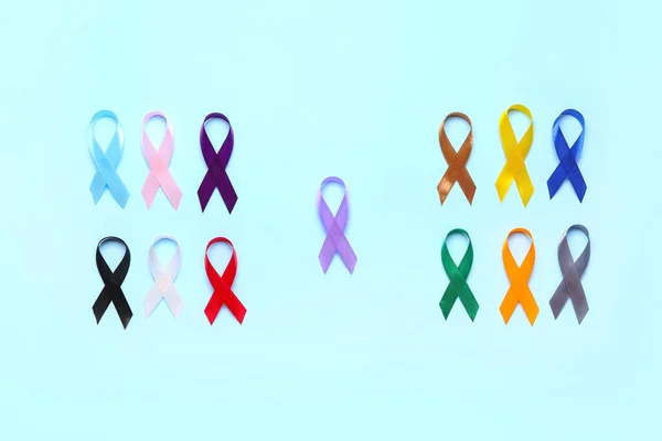 Composition Different Awareness Ribbons Blue Background World Cancer Day — Stock Photo, Image