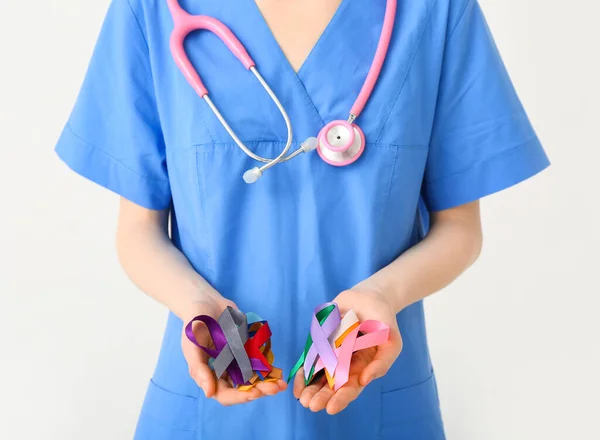 Female Doctor Holding Different Awareness Ribbons White Background World Cancer — Stock Photo, Image