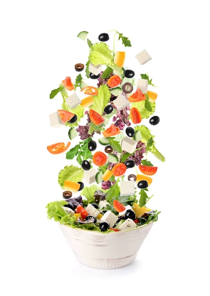 Bowl Flying Ingredients Healthy Greek Salad White Background — ストック写真