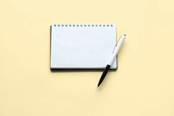 Notebook Pen Light Yellow Background — Stock Photo, Image